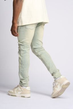 "LOVE IS PAIN" EMBOSSED SKINNY DENIM