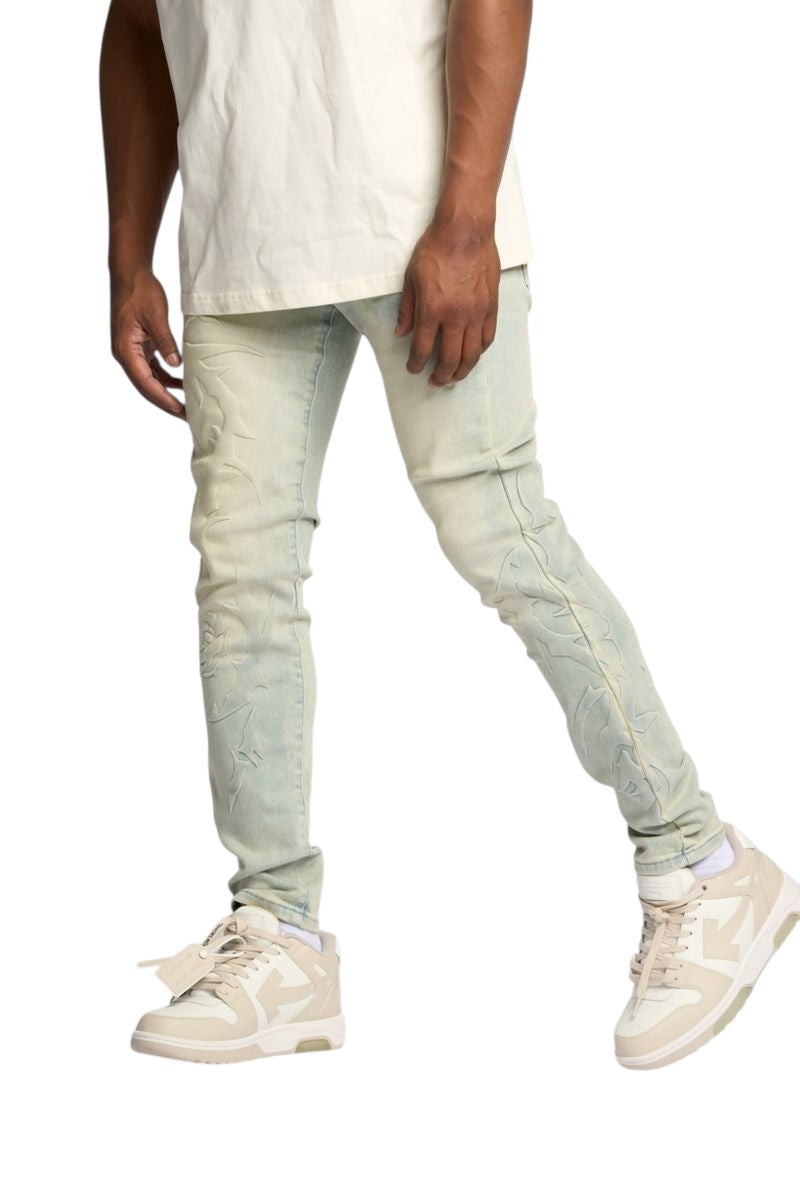 "LOVE IS PAIN" EMBOSSED SKINNY DENIM