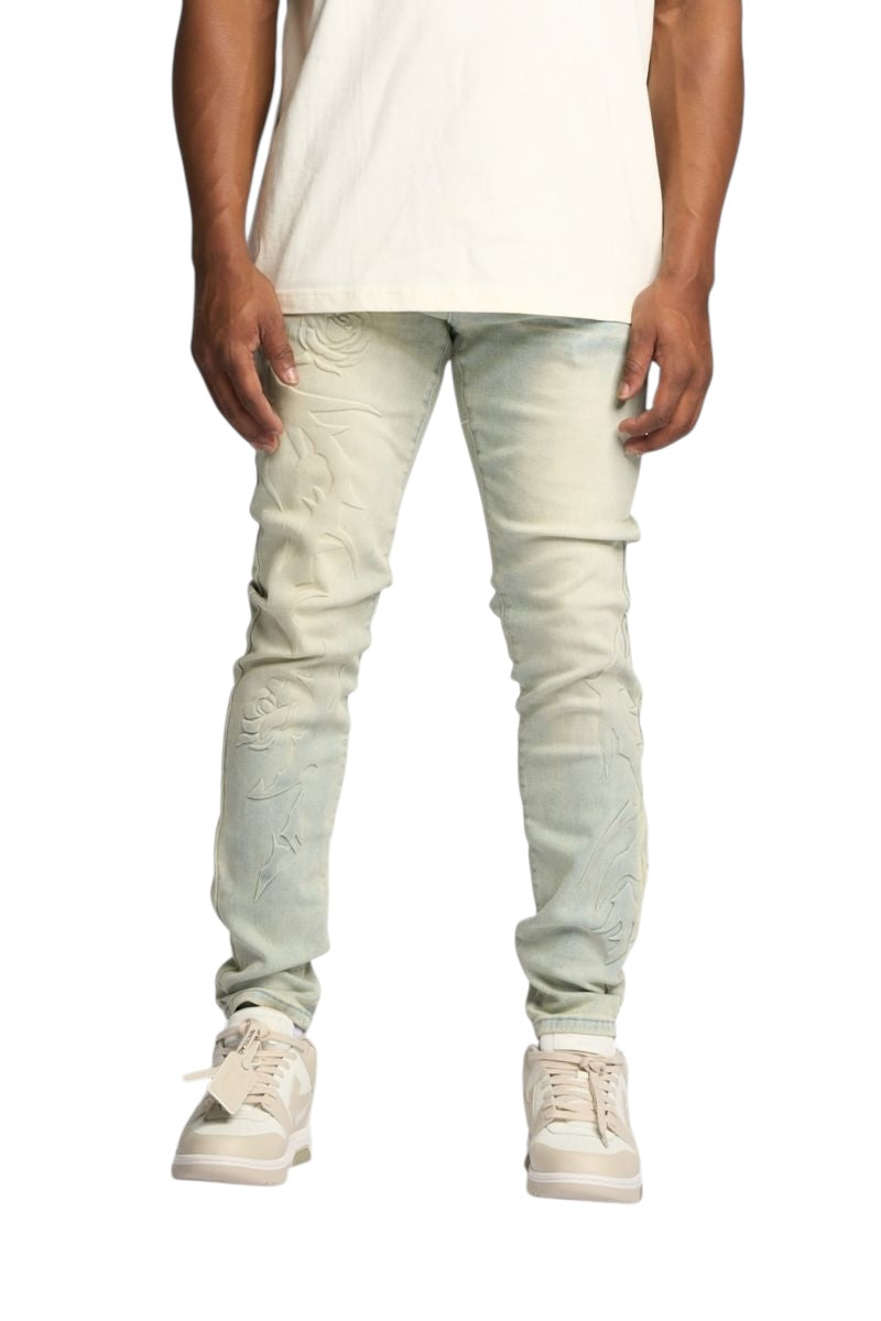 "LOVE IS PAIN" EMBOSSED SKINNY DENIM
